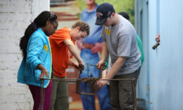 Students working with rebar