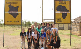Mercer On Mission team standing together at the equator