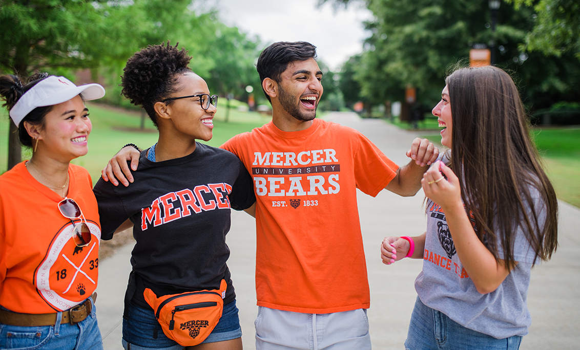 Four Mercer students posing for a photo