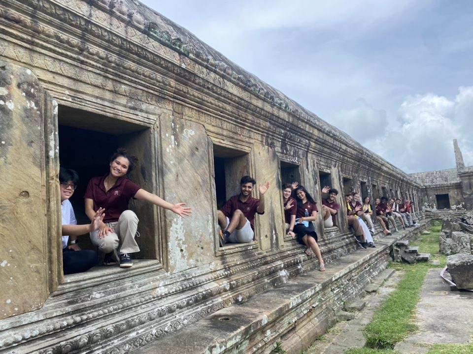 Mercer on Mission Team in Windows of Cultural Site