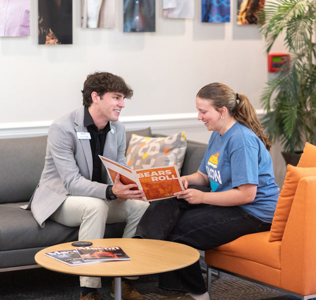 Admissions counselor talking to prospective student
