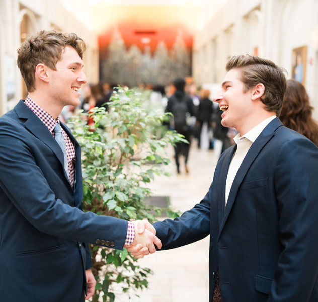 Students shaking hands at Mercer's Career Fair