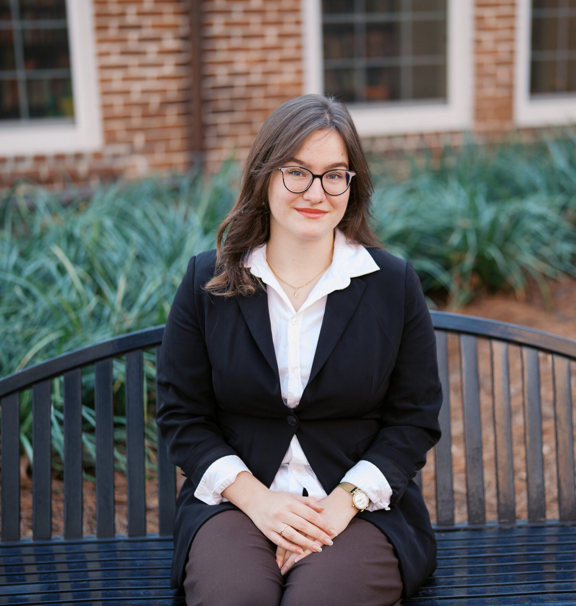 International student sitting on bench